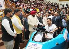 Governor unveiling the electric vehicle designed specifically for the differently abled under the auspices of IIT Roorkee.;?>