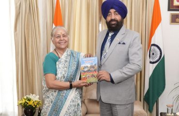 Padma Shri Dr. Madhuri Barthwal presenting her book 'Maangal' - Sanskar Folk Songs of Garhwal' to the Hon'ble Governor.