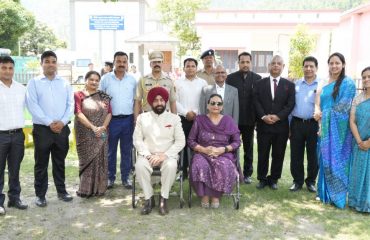 Hon'ble Governor with officials at Kalsi Animal Breeding Farm.