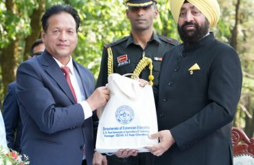 Vice Chancellor of GB Pant Agricultural and Technology University Dr. Manmohan Singh Chauhan presenting honey kit to the Hon'ble Governor.