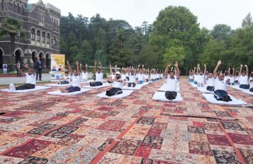 Hon'ble Governor participating in a collective yoga session on the occasion of International Yoga Day.