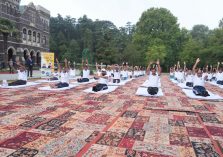 Hon'ble Governor participating in a collective yoga session on the occasion of International Yoga Day.;?>