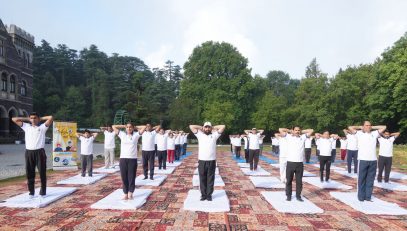 Hon'ble Governor participating in a collective yoga session on the occasion of International Yoga Day.