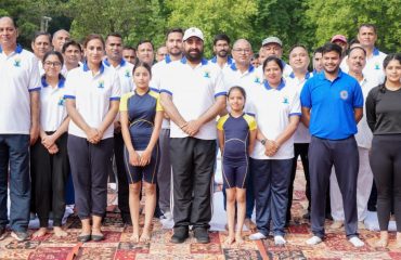 Hon'ble Governor with the officials and employees of Raj Bhawan on the occasion of International Yoga Day.