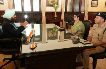 District Magistrate Nainital, Vandana Singh and SSP P.N. Meena paying courtesy call on the Hon'ble Governor.