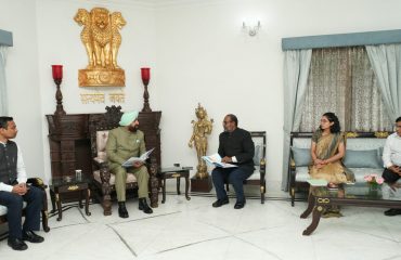 Hon'ble Governor in conversation with election officials at Raj Bhawan.