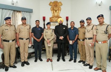 Hon'ble Governor with the security personnel working at Raj Bhawan.