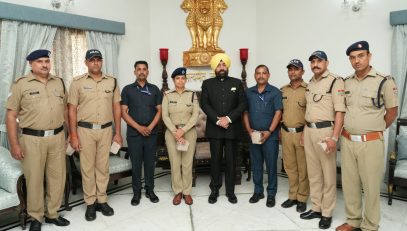 Hon'ble Governor with the security personnel working at Raj Bhawan.