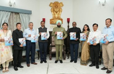 Hon'ble Governor releasing the book 