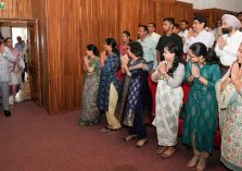 Hon'ble Governor accepting the greetings from the employees at the Parivar Milan program organized at the Raj Bhawan Auditorium.;?>