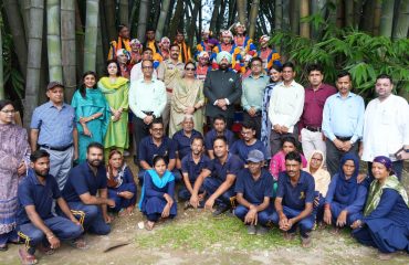 Hon'ble Governor and First Lady Smt. Gurmeet Kaur with the artists of Chholiya Dance Group, officers and employees of Raj Bhawan.