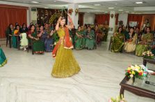 Women performing a captivating dance in the Teej competition on the auspicious occasion of “Hariyali Teej”.;?>