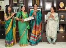 First Lady Smt. Gurmeet Kaur felicitating Mrs. Santoshi for becoming Teej Queen in the Teej competition.;?>
