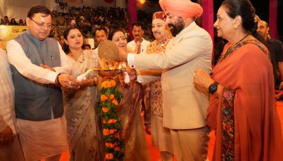 Governor and Chief Minister lighting the lamp at the program organized on the occasion of Shri Krishna Janmashtami at Police Line, Dehradun.