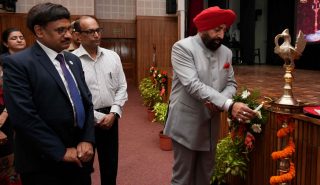 Governor inaugurating the seminar on financial and tax literacy at Raj Bhawan.