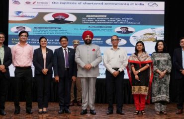 Governor with officials on the occasion of the seminar on financial and tax literacy at Raj Bhawan.