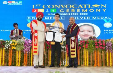 Governor presenting medals and degrees to the students on the convocation.