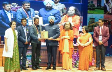 Governor felicitating the doctors who provided commendable services on the occasion of the program.