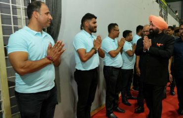 Governor meeting the players on the occasion of the closing ceremony of the kick boxing competition held at Parade Ground, Dehradun.