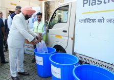 Governor inaugurating the 'Plastic Bank' in the Raj Bhawan campus after the program.;?>