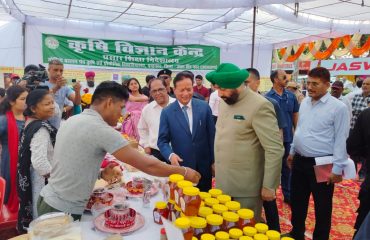 Governor inspecting the stalls at Kisan Mela.