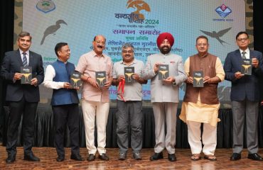 ⁠Governor releasing the book Moths of INDIA: A FIELD GUIDE written by Sanjay Sondhi in the program.