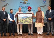 ⁠Forest Minister Subodh Uniyal presenting photo frames of wildlife to the Governor.;?>