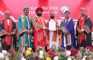 Governor awarding degrees to students at the convocation.