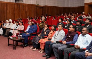 Governor watching the captivating performances of various cultural programs.