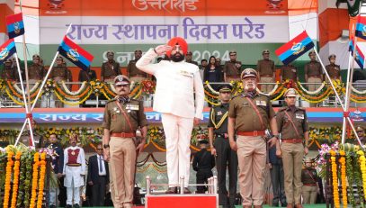 Governor taking salute of the parade in the program organized at Police Line, Dehradun on the occasion of State Foundation Day.