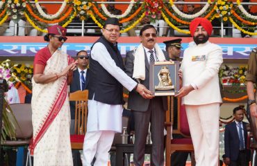 Governor and Chief Minister honoring actor Dr. Mahesh Kudiyal with the 