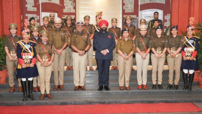 Governor with the parade commanders who led the parade on State Foundation Day.