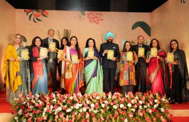 Governor releasing the book 'Swallowing The Sun' written by Smt. Laxmi Murdeshwar Puri.