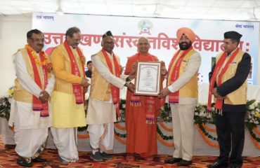 Governor conferring the degree of Vidya Vachaspati (D Litt) to Swami Govind Dev Giri Ji.