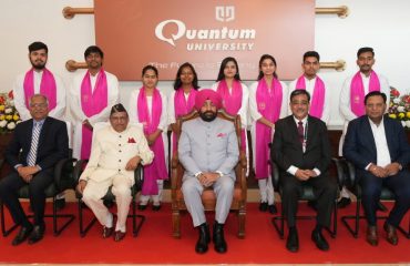 Governor with students receiving medals and degrees on the occasion of the 4th convocation of Quantum University, Roorkee, Haridwar.