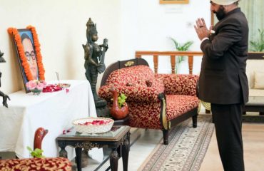 The Governor paying homage to Bharat Ratna Baba Saheb Dr. Bhimrao Ambedkar by laying flowers on his portrait on the occasion of Mahaparinirvan Diwas.