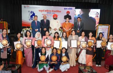 Governor with women scientists and girl students at the Women Scientists Conclave programme organised by USERC.