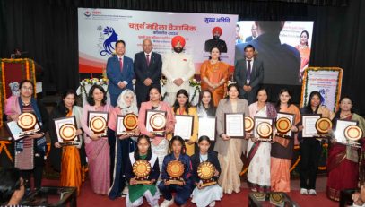 Governor with women scientists and girl students at the Women Scientists Conclave programme organised by USERC.