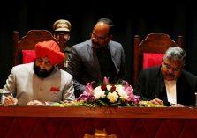 Governor administering the oath of office to the newly appointed Chief Justice of Uttarakhand High Court Justice Guhanathan Narendar.;?>