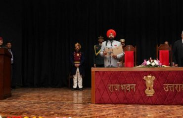 Governor administering the oath of office to the newly appointed Chief Justice of Uttarakhand High Court Justice Guhanathan Narendar.