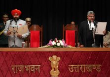 Governor administering the oath of office to the newly appointed Chief Justice of Uttarakhand High Court Justice Guhanathan Narendar.;?>