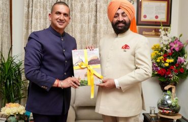 Governor releasing a pictorial book dedicated to 