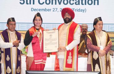 Governor awarding degrees and medals to students at the fifth convocation of Doon University.