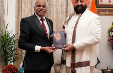 Padma Shri Dr. BKS Sanjay presenting his self-written book 'Uphaar Sandesh Ka' to the Governor.