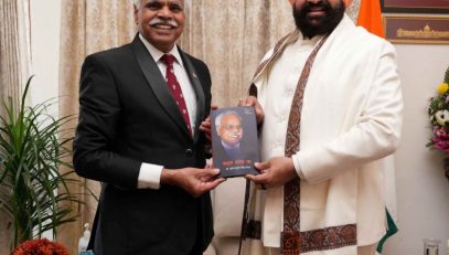 Padma Shri Dr. BKS Sanjay presenting his self-written book 'Uphaar Sandesh Ka' to the Governor.