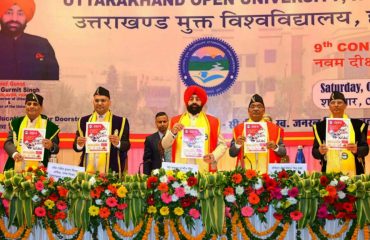 Governor releasing the book 'Udaan' at the 9th convocation of Uttarakhand Open University, Haldwani.