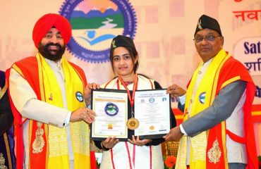 Governor awarding medals and degrees to students at the 9th convocation of Uttarakhand Open University, Haldwani.