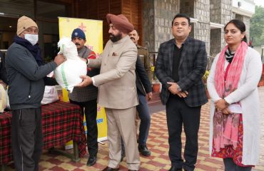 Governor distributing monthly nutrition kits to 13 TB patients adopted under National TB Eradication Program at Raj Bhawan.