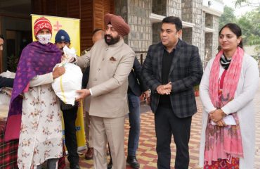 Governor distributing monthly nutrition kits to 13 TB patients adopted under National TB Eradication Program at Raj Bhawan.