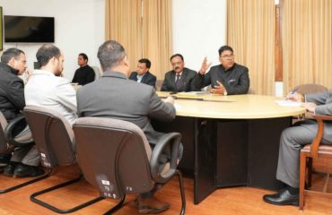 Governor reviewing the progress of research on 'One University-One Research' at Raj Bhawan.